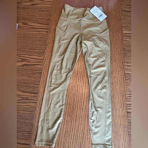Fabletics Pants - NWT Fabletics Shimmering Gold Oasis High Waisted Pocket 7/8 Leggings  Size XS
